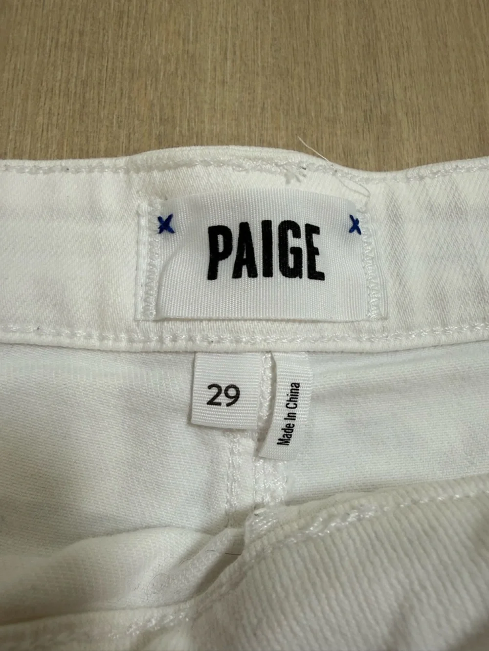 PAIGE White Denim Frayed Hem Shorts